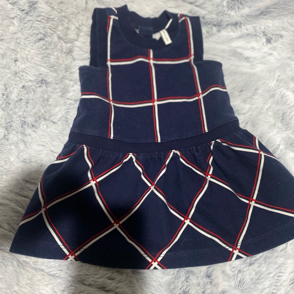 Beautiful jumper navy just put a onesie and she is ready to cooler days